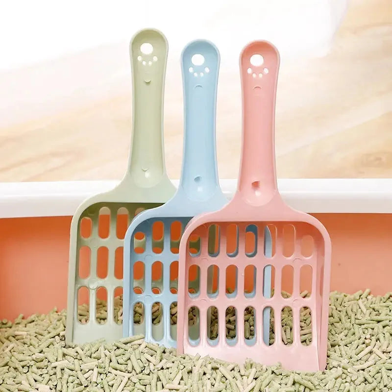 Blue plastic cat litter scoop showing length and sieve pattern for cleaning litter trays.