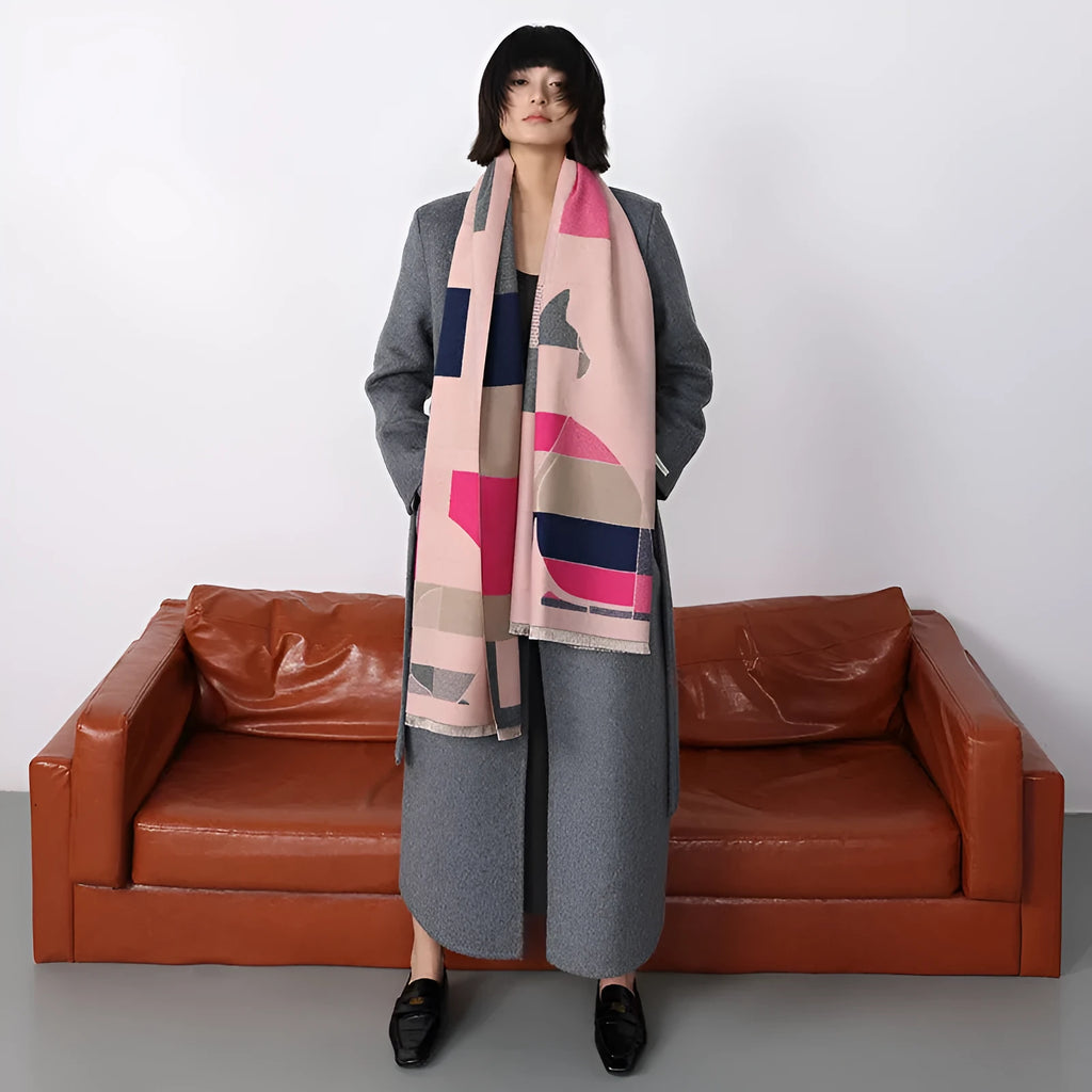 Beige imitation cashmere scarf draped to show its 185cm length and 65cm width.