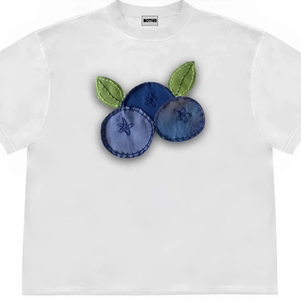 Blueberry and floral patchwork print on a loose-fit, short-sleeved ice oxygen cotton T-shirt.