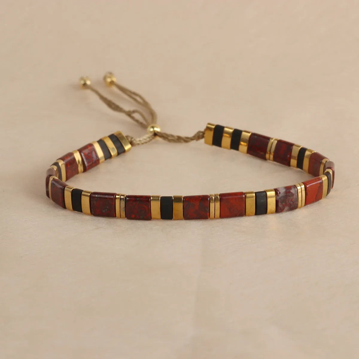 European American style pull bead bracelet with geometric designs in five colour options