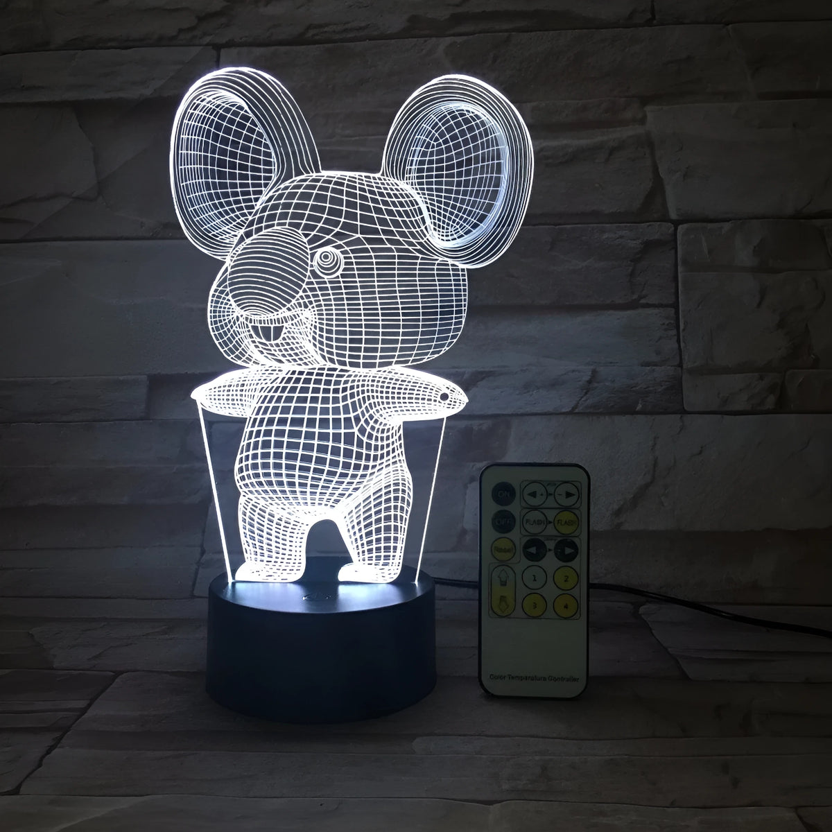 Black koala-shaped LED night light with seven colour options and touch/remote control