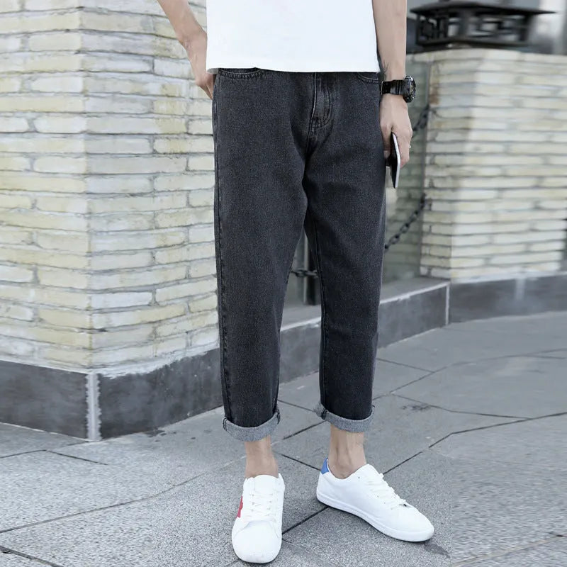 Men's loose straight leg jeans in black and blue colours showing straight cut and light straight leg opening