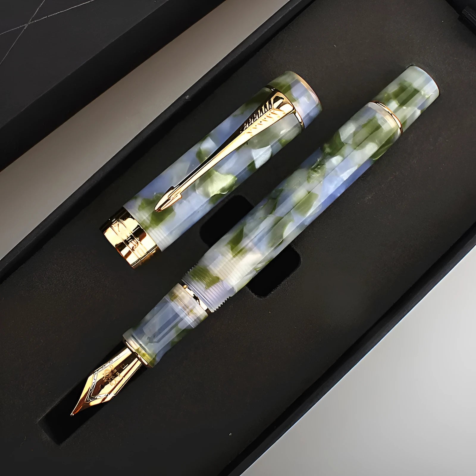 Deep bath green metal pen showing 0.5mm, 0.7mm, and 1.0mm tip size options