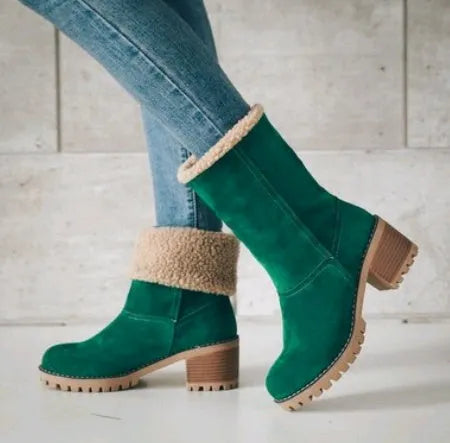 Women's mid-calf suede snow boots with a low heel and round toe in multiple colour options.