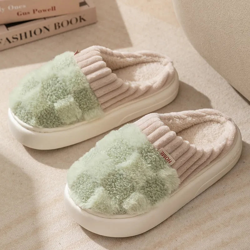 Women's plaid patterned plush slippers with a non-slip PVC sole, shown in a selection of colours including coffee, green, and pink.