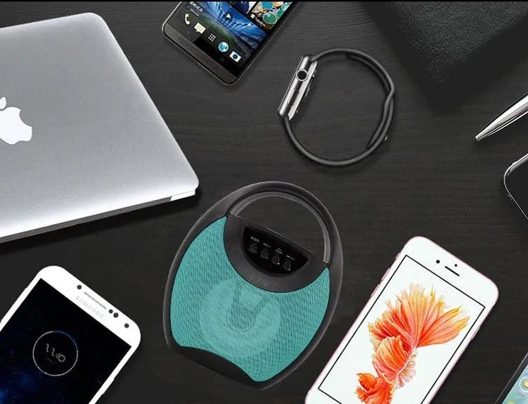 Portable Bluetooth speaker in black plastic casing with USB and SD card slots