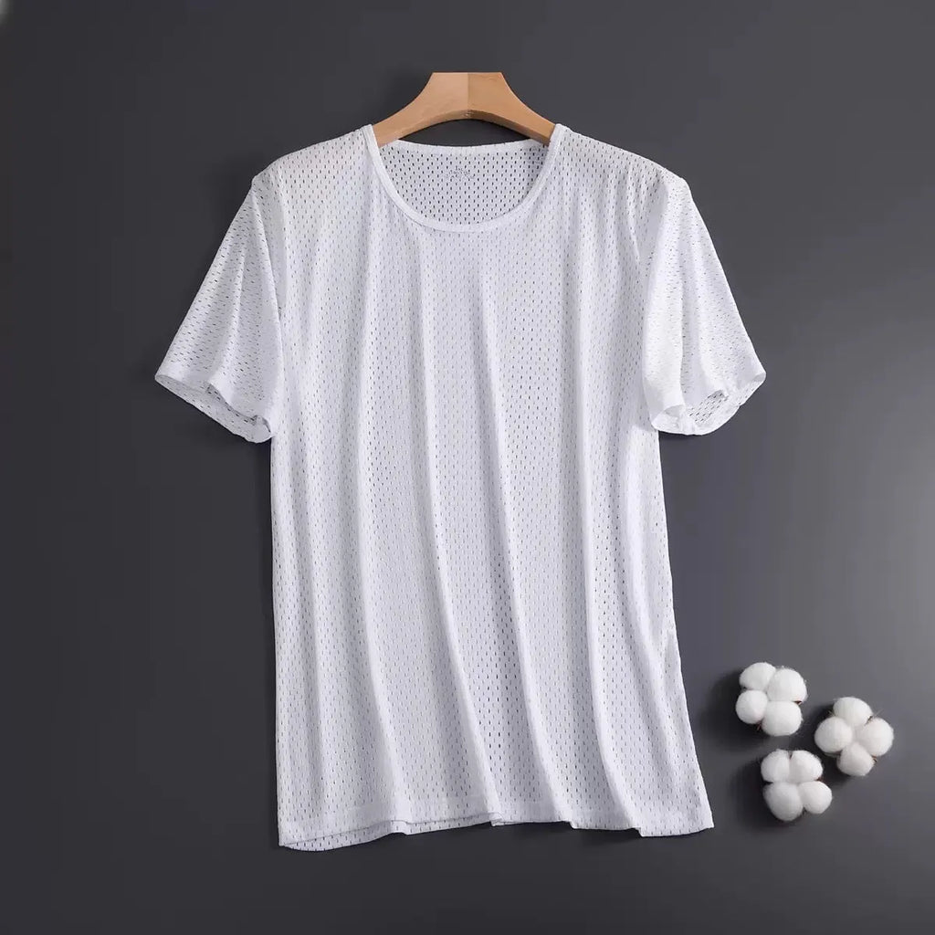 Man wearing a solid colour ice silk short sleeve crew neck t-shirt in a loose fit.