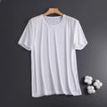 Man wearing a solid colour ice silk short sleeve crew neck t-shirt in a loose fit.