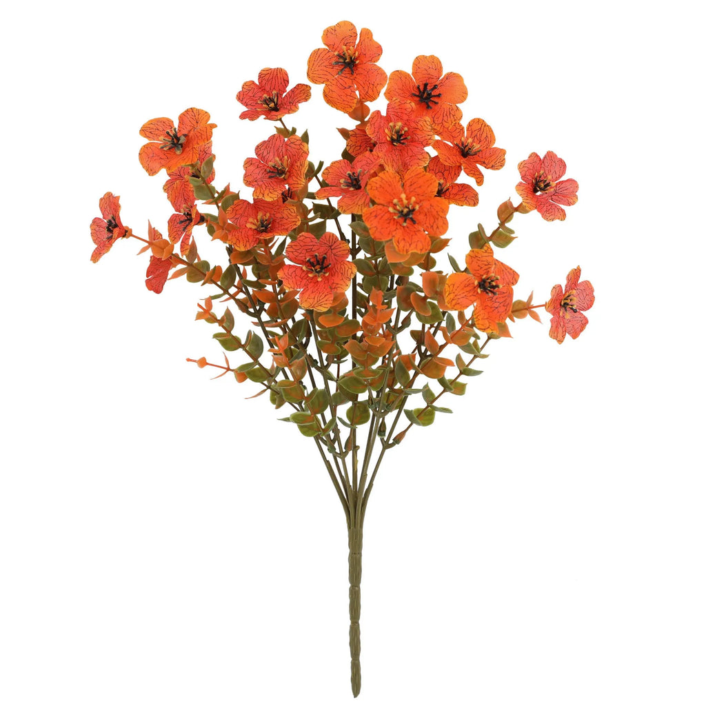 Artificial silk and plastic flower bouquet in autumn colours of red, yellow, and orange for home or wedding decoration