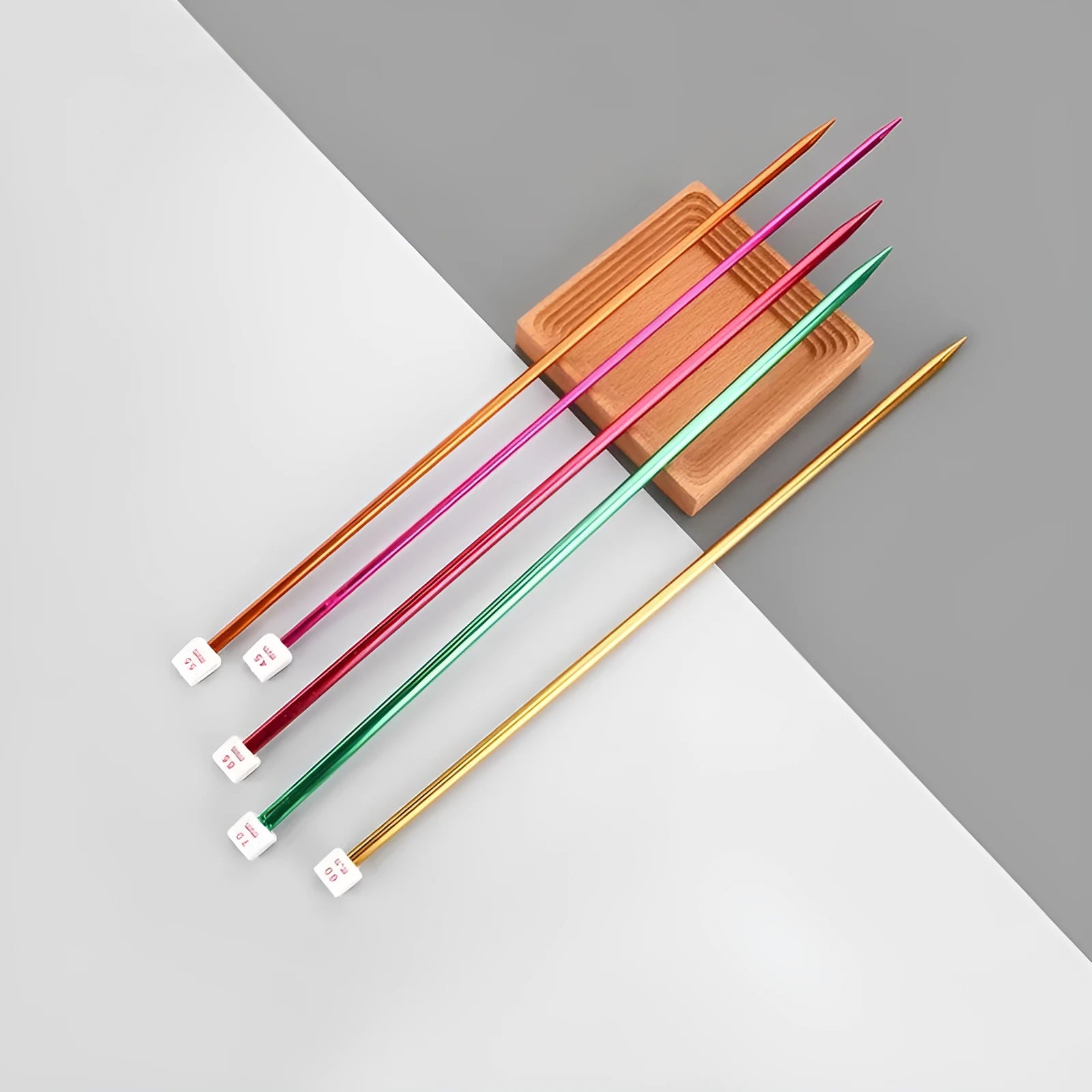 Set of aluminium crochet hooks with protective caps in multiple sizes from 2.0mm to 10.0mm.