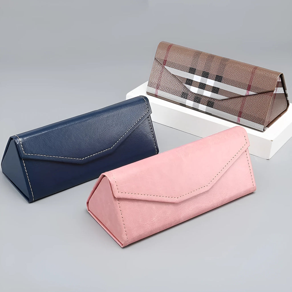 Handmade glasses case with PU cowhide exterior and rigid cardboard construction showing compression resistance