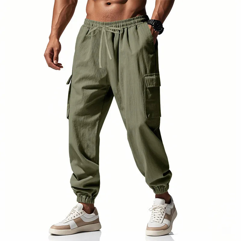 Men's linen casual trousers with ankle drawstring and multiple pockets in solid colour