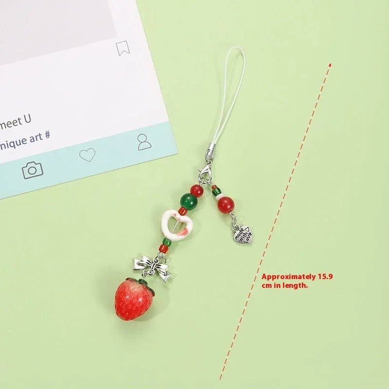 Fruit pattern mobile phone charm keychain with apple and strawberry designs on plastic resin