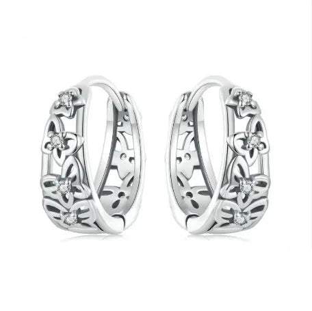 Sterling silver retro hollow butterfly earrings with zircon accents measuring 14mm by 5mm