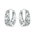 Sterling silver retro hollow butterfly earrings with zircon accents measuring 14mm by 5mm