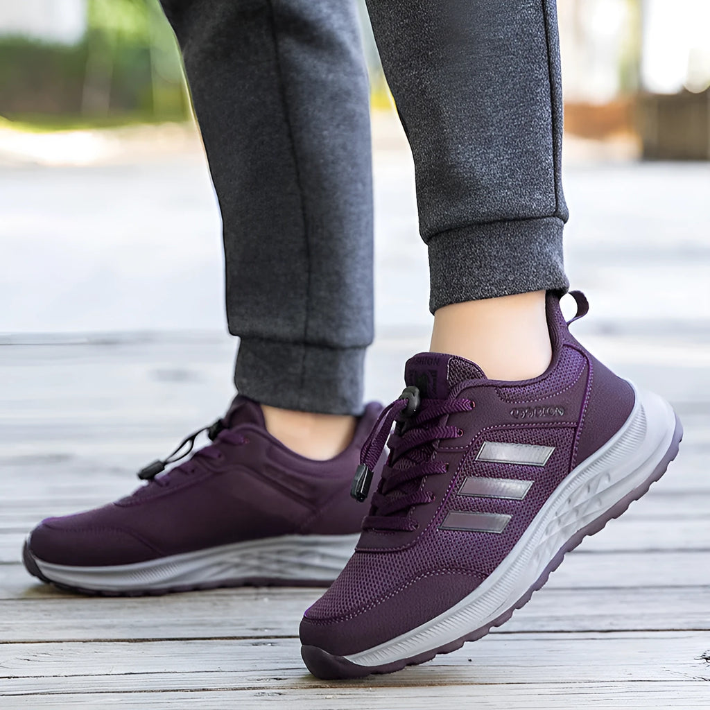 Men's and women's casual mesh slip-on shoes with an elastic band in black, purple, red, and dark grey.