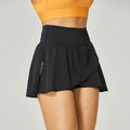 Women's solid colour quick-dry nylon sports shorts with spandex lining for fitness.