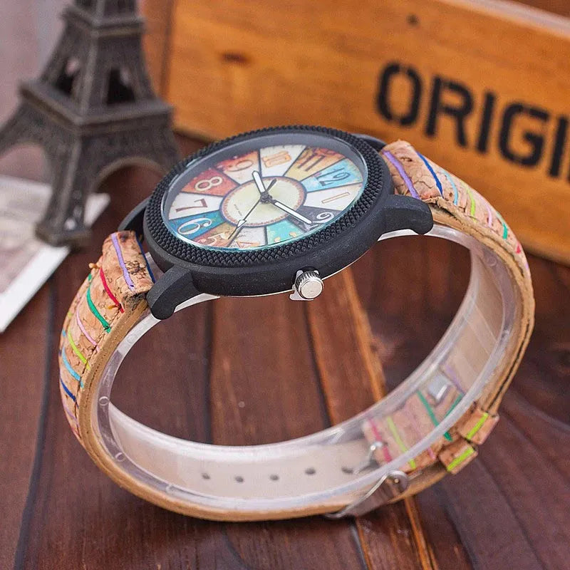 Women's leather strap quartz watch with 37mm round dial and stainless steel buckle