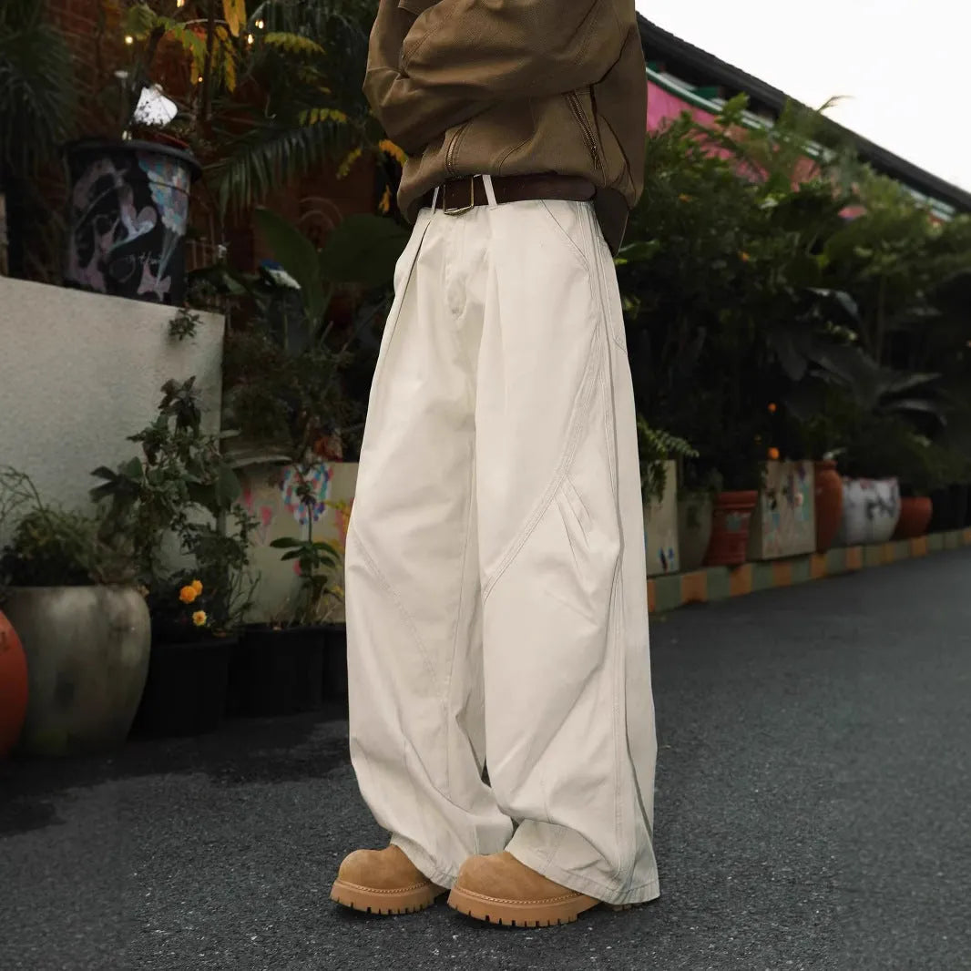 Men's pleated straight-leg trousers in a striped pattern, shown in apricot colour.