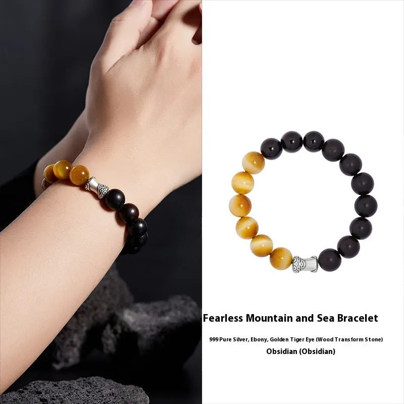 Men's handmade obsidian bracelet with sterling silver accents, Mountain and Sea Fearless design