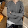 Plus size women's loose grey striped texture long sleeve pullover top on a hanger.