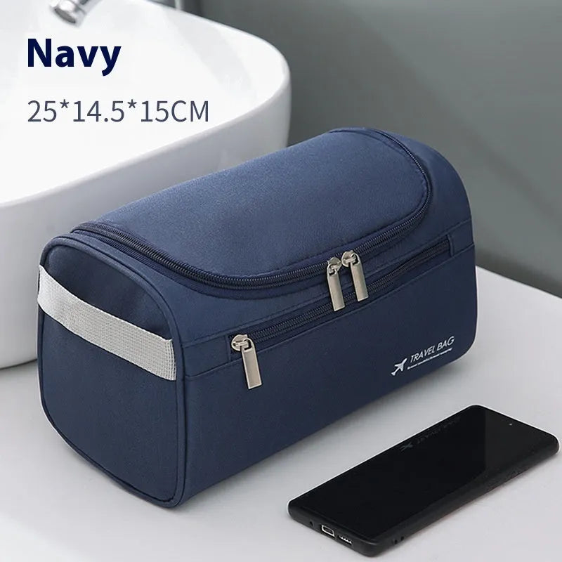 Large capacity waterproof makeup bag in Pu leather available in six colour options including black, navy, beige and brown