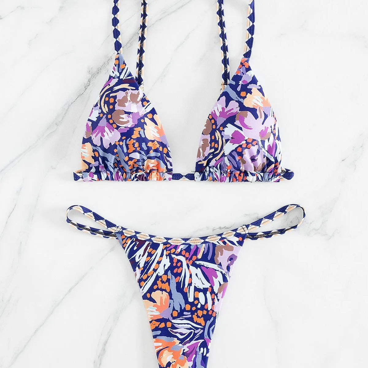 Women's floral print polyester bikini swimsuit with triangle cup top and briefs style bottoms