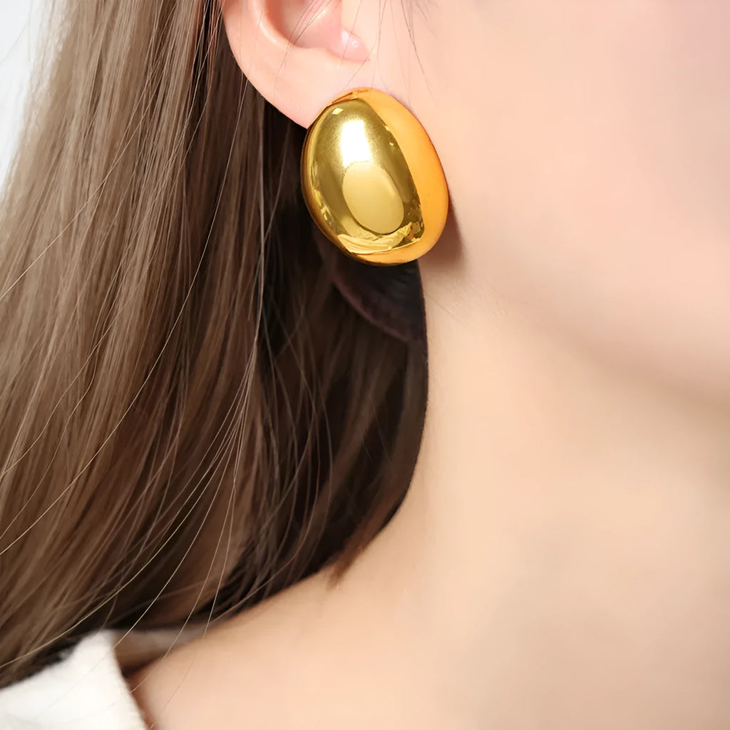 Geometric earrings with exaggerated glazed surface and 18K gold colour electroplated finish