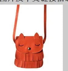 Small girls crossbody bag in PU with fox and tassel design, shown in black, brown, grey, pink, and orange