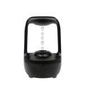 White anti-gravity humidifier showing water drop backflow effect with USB cable connection