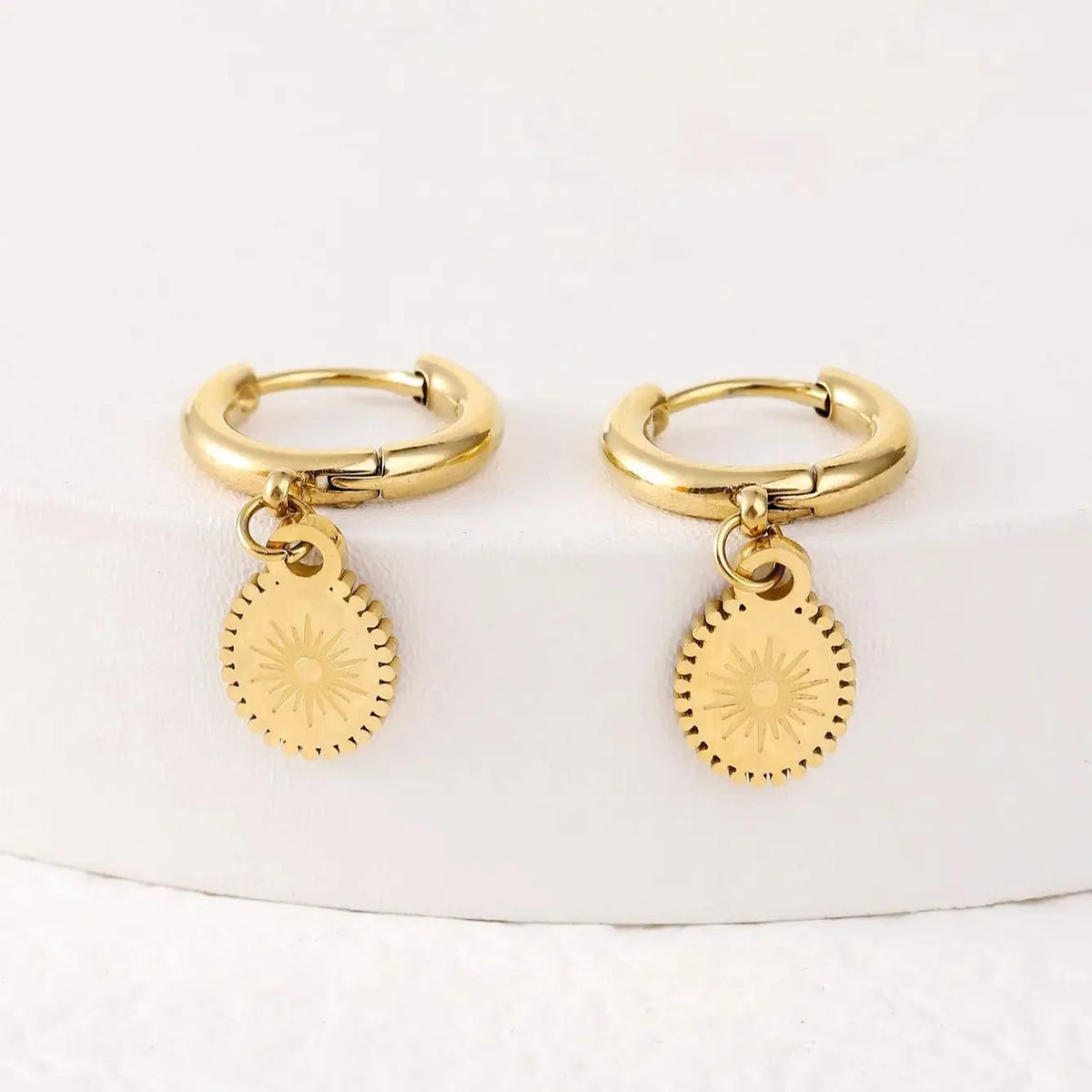 Stainless steel ellipse geometry earrings with ear button fittings in colour XY-EH005