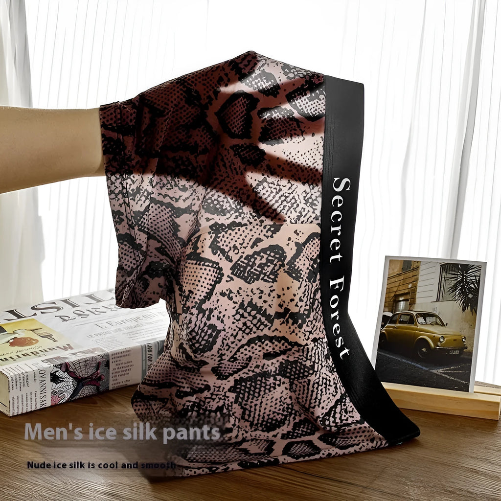 Men's loose fit thin boxer shorts in black, grey, or brown polyester knit fabric.
