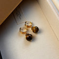 Maillard geometric tigereye earrings with gold plating in black and brown colour options