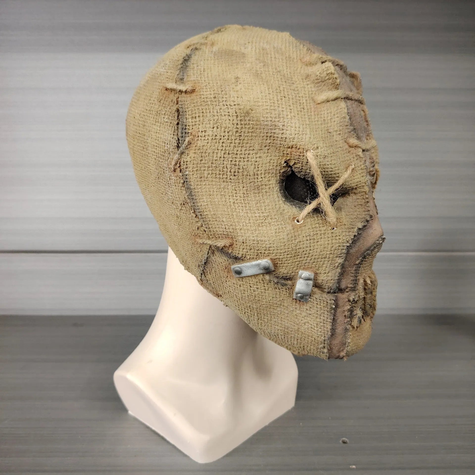 Latex horror mask with scar skull design covering full head, dimensions 31cm by 25cm