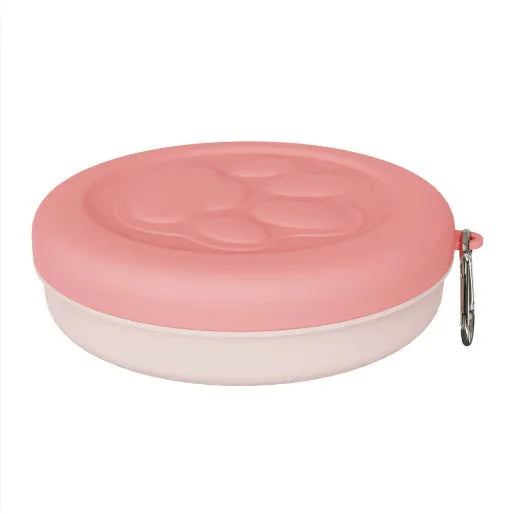 Collapsible silicone dog bowl in pink and green colours, shown both open and folded flat