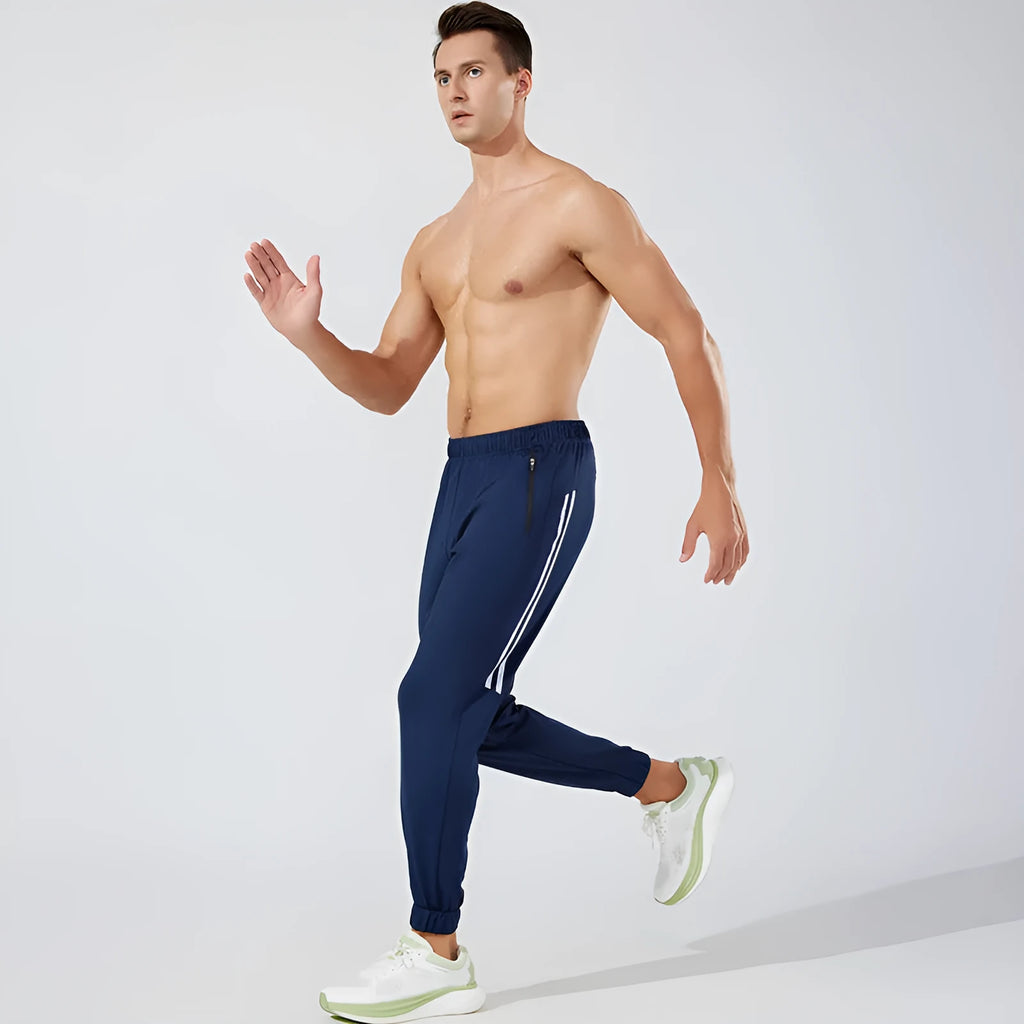 Men's black running trousers with mid waist design for exercise and casual wear