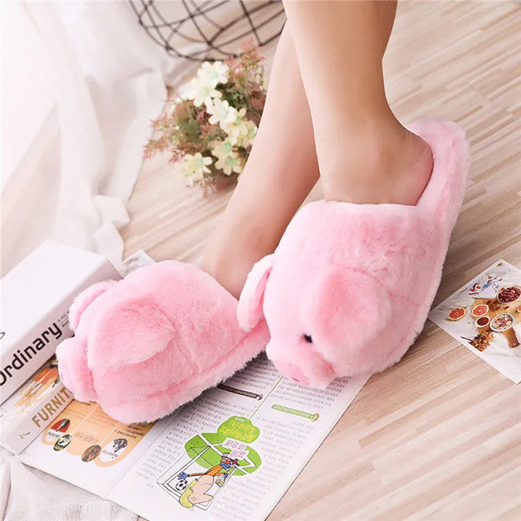 Pink pig design floor slippers made from short plush with PP cotton filling.
