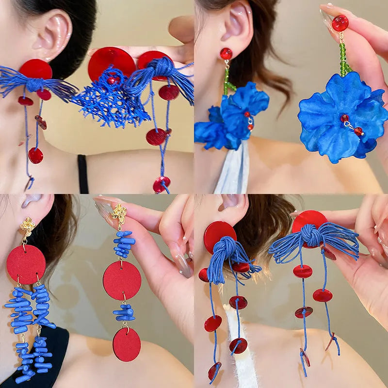 Geometric cloth earrings with blue resin flower and silver needle colour details