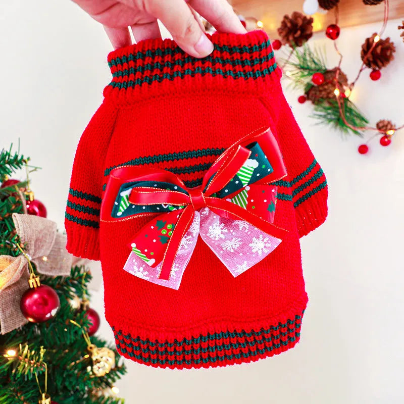 Red and green dog Christmas jumpers showing weight-based sizing from XS to XL for holiday pet wear