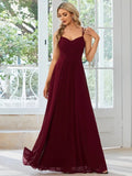 Women's sleeveless A-line pleated dress with sling neckline in light green colour