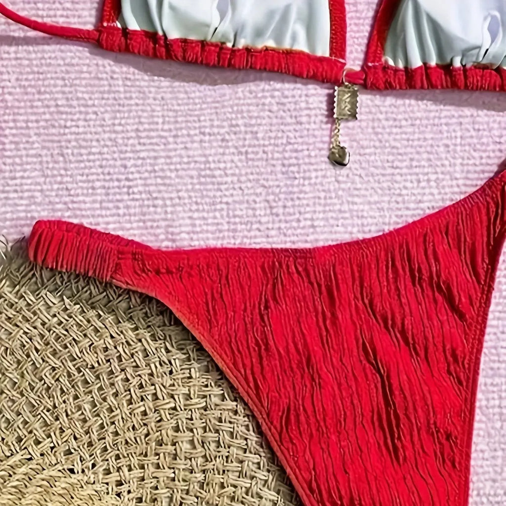 Red high waisted bikini set with tied split front and pleated detail, polyester nylon, sizes S to XL