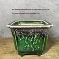 Square ceramic decals stoneware flower pot 22cm, green glaze change finish, placed on wooden desktop with small plant inside