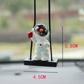 Resin cartoon astronaut car pendant decoration showing various astronaut character designs