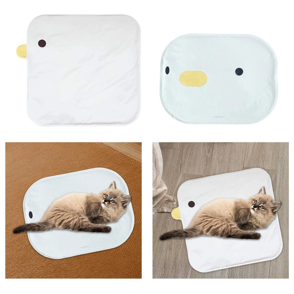 Square chick-shaped blue pet cooling mat on a wooden floor.