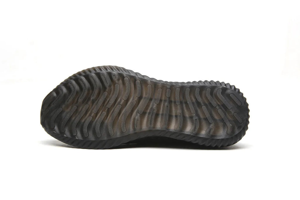 Black work safety shoe with steel toe cap and EVA sole on a grey background