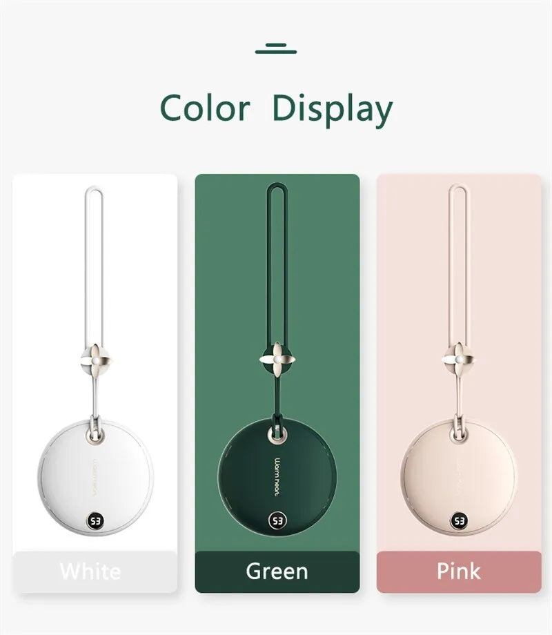 Green 5000mAh hand warmer power bank with digital display, shown next to its included USB charging cable.