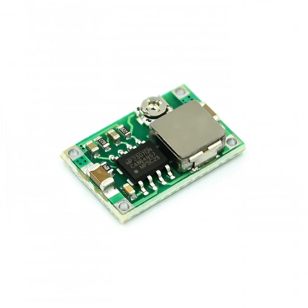 Mini-360 green DC-DC buck converter module measuring 17x11mm with synchronous rectification
