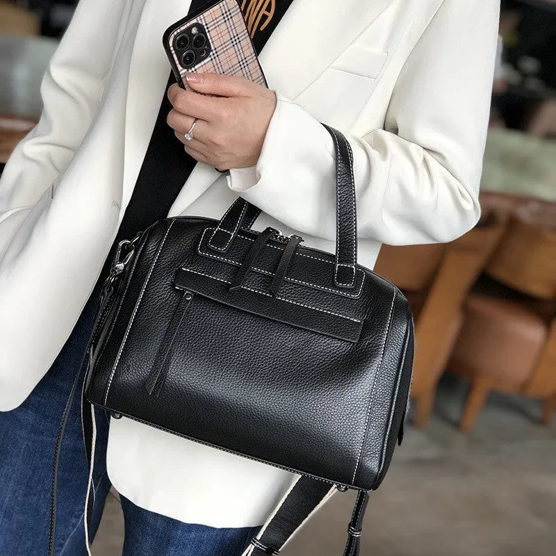 Men's horizontal square leather messenger bag with litchi pattern, shown in elephant grey with shoulder strap.