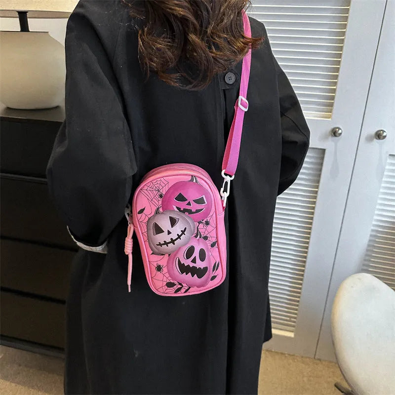 Halloween graffiti print crossbody bag with cartoon pumpkin, ghost and bat designs