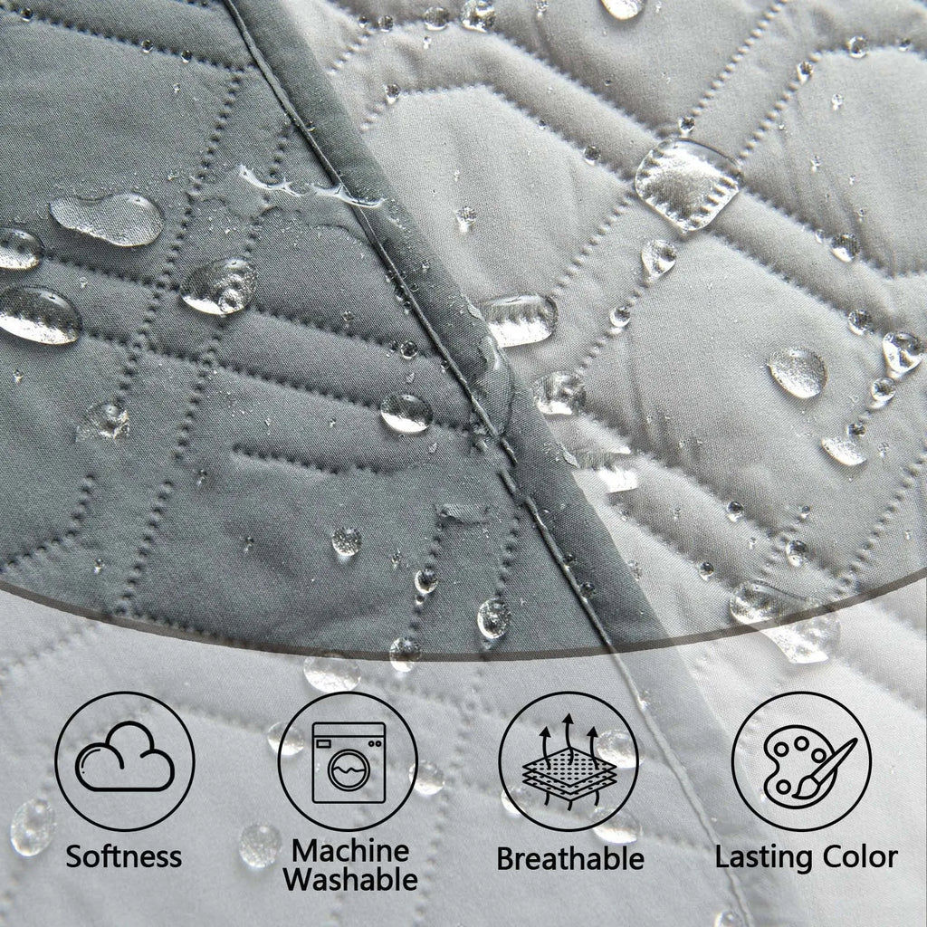 Double-sided waterproof dog sofa cushion showing dark grey and light grey reversible sides on a sofa.